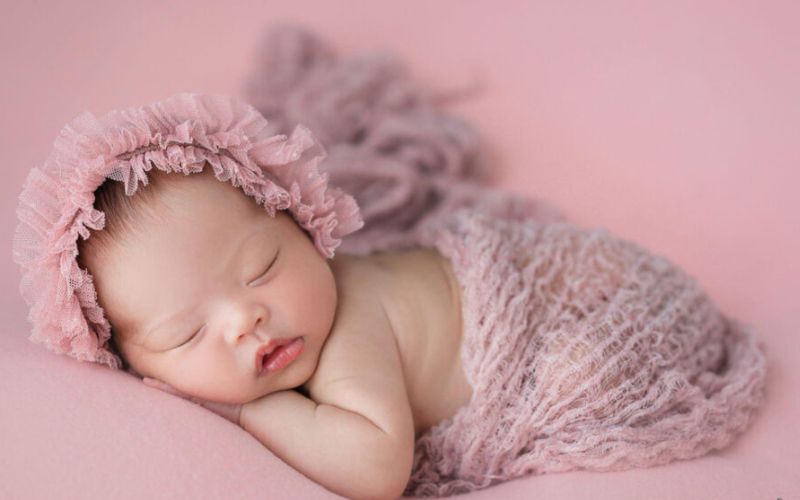 mơ thấy em bé cười